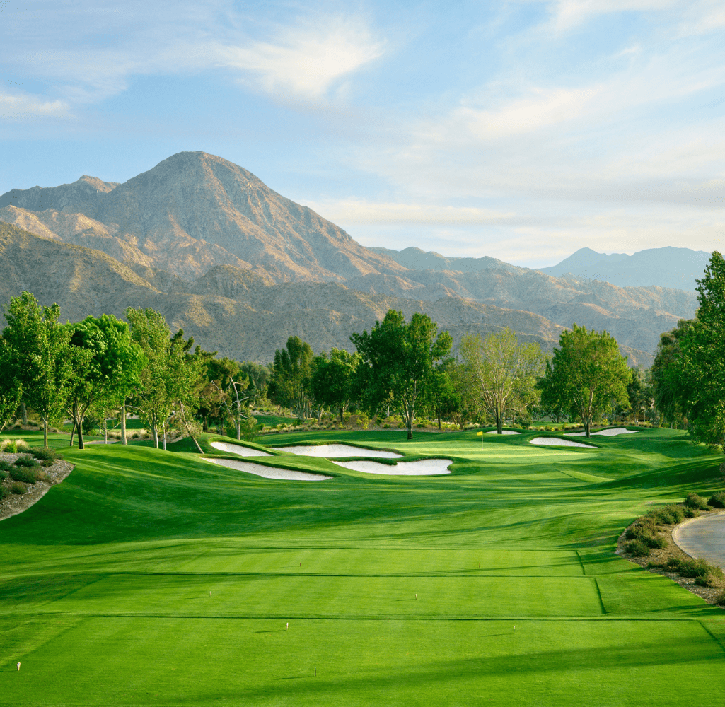 View of Indian Wells Golf Course including mountains and trees in the background